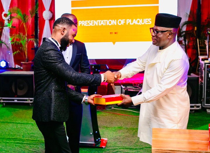 Davida CEO receiving an award