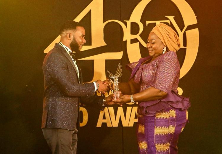 Davida CEO receiving and award