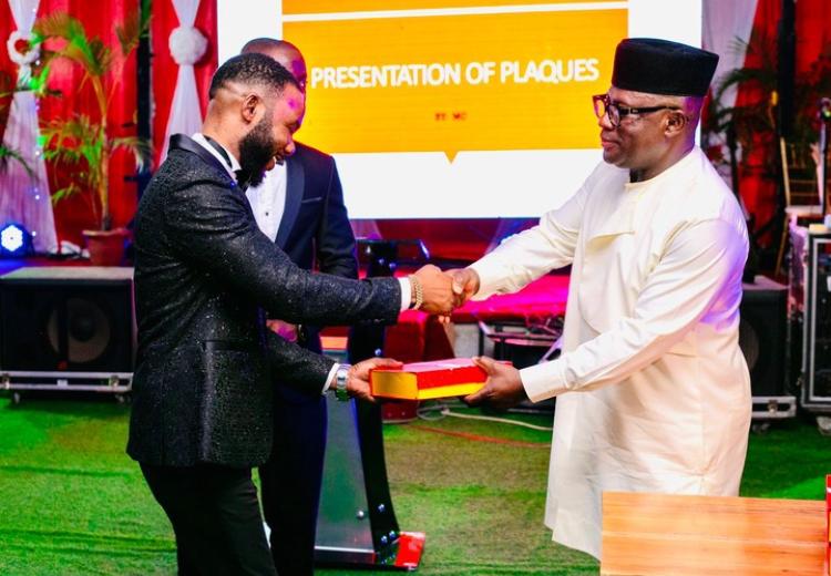 Davida CEO receiving an award