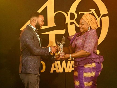 Davida CEO receiving and award