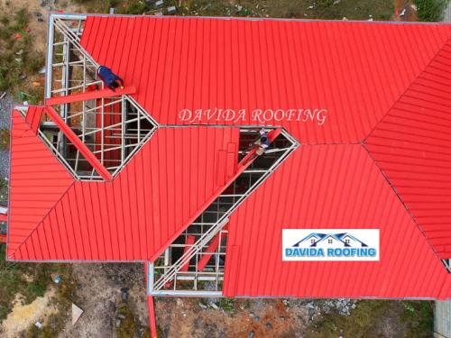 photo of engineers installing a roof